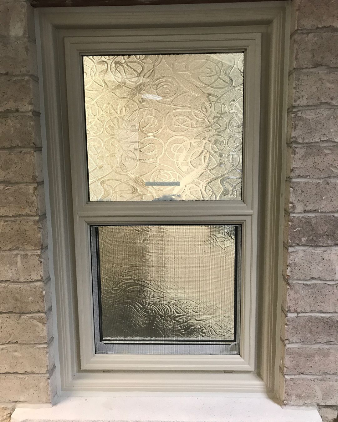 Modern Hung Windows in Toronto home – energy-efficient vinyl design with easy tilt cleaning and smooth operation.