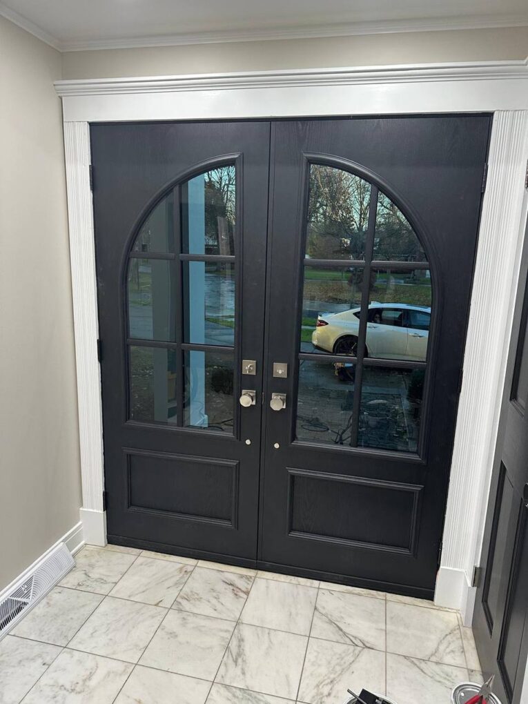 After Custom Matte-Black Fiberglass Double Doors With Arched Glass (2)