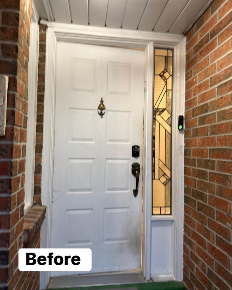 Before old steel front door in Toronto home before replacement.