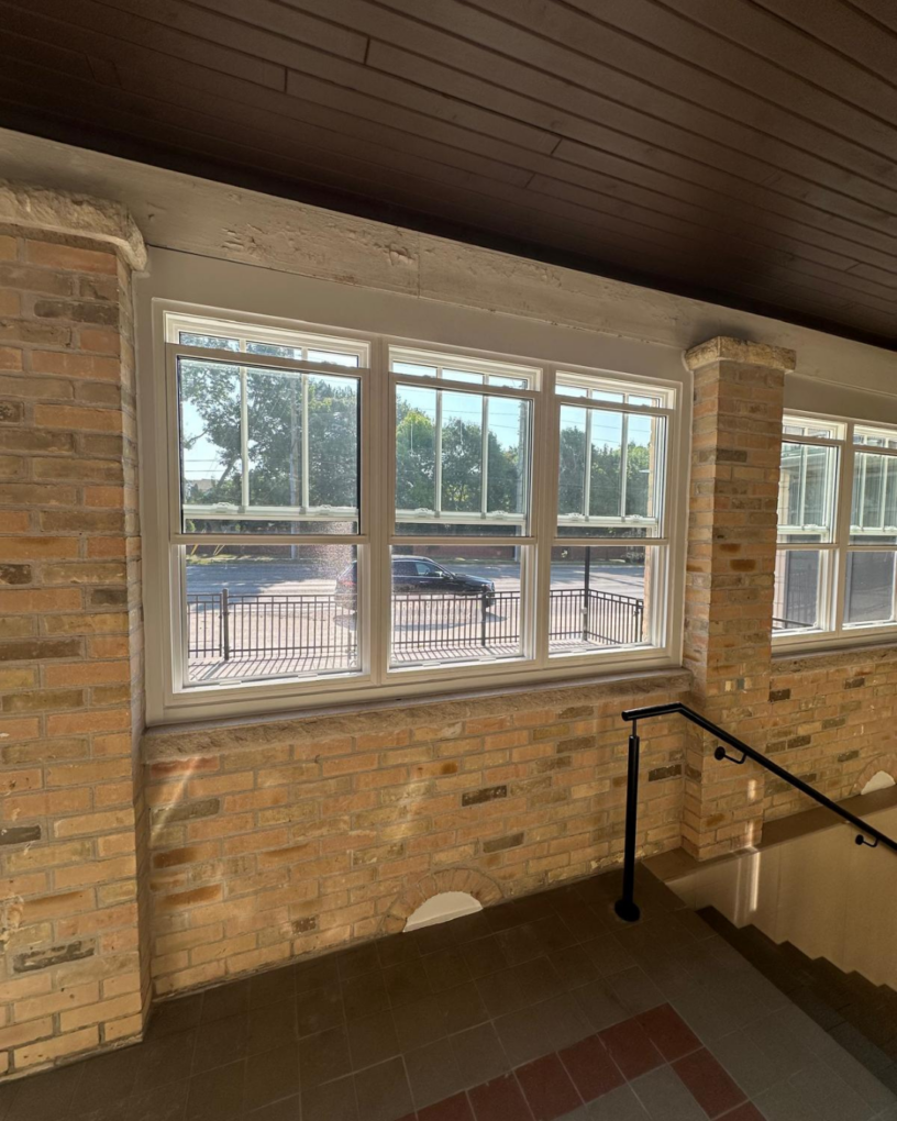 Interior view of upgraded windows in a heritage home stairwell in Toronto