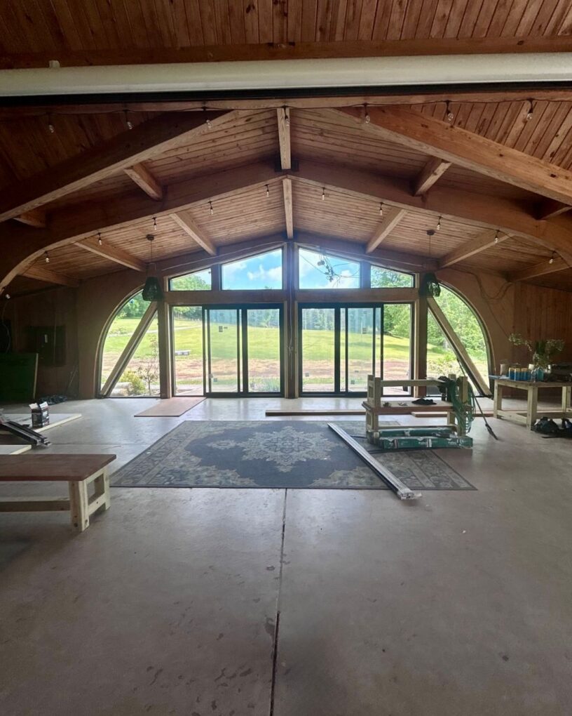 After custom shaped windows and stacked sliding doors opened the space to the view.