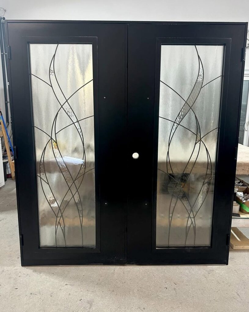 Black fiberglass double doors installed for a church entrance in New Jersey