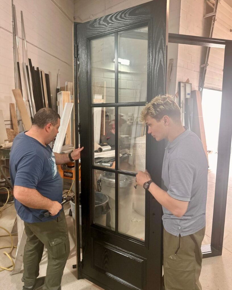 Custom 8-foot fiberglass double door during final quality checks