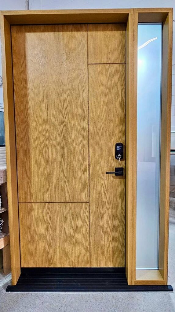 Stained fiberglass front door with woodgrain finish and sidelight